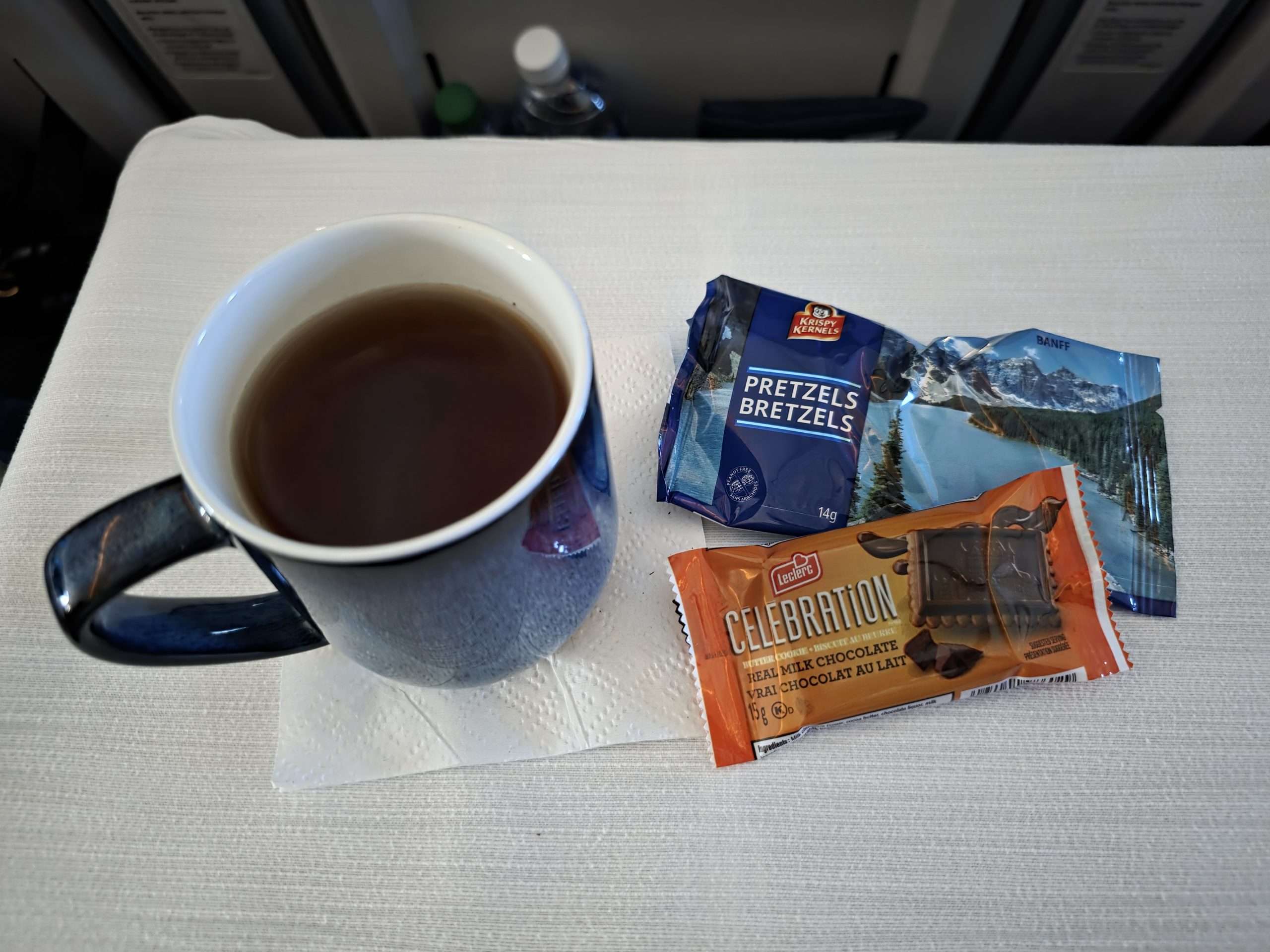 WestJet Premium Economy pre-dinner tea pretzels Celebration chocolate cookie snack