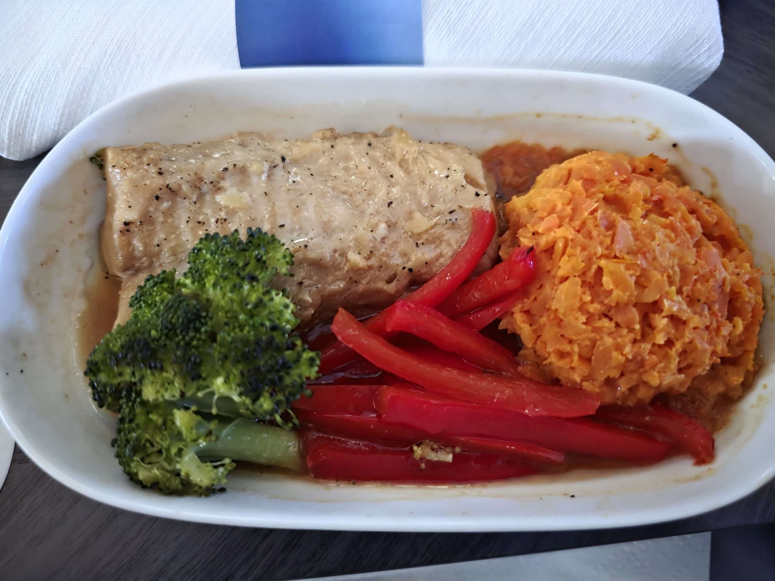 WestJet Premium Economy miso butter Atlantic cod carrot puree broccoli red pepper inflight meal