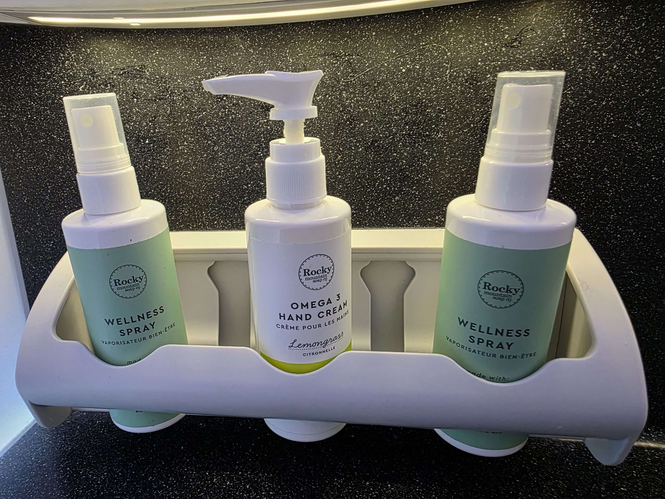 WestJet Premium Economy Rocky Mountain Soap wellness spray omega hand cream washroom Boeing 787