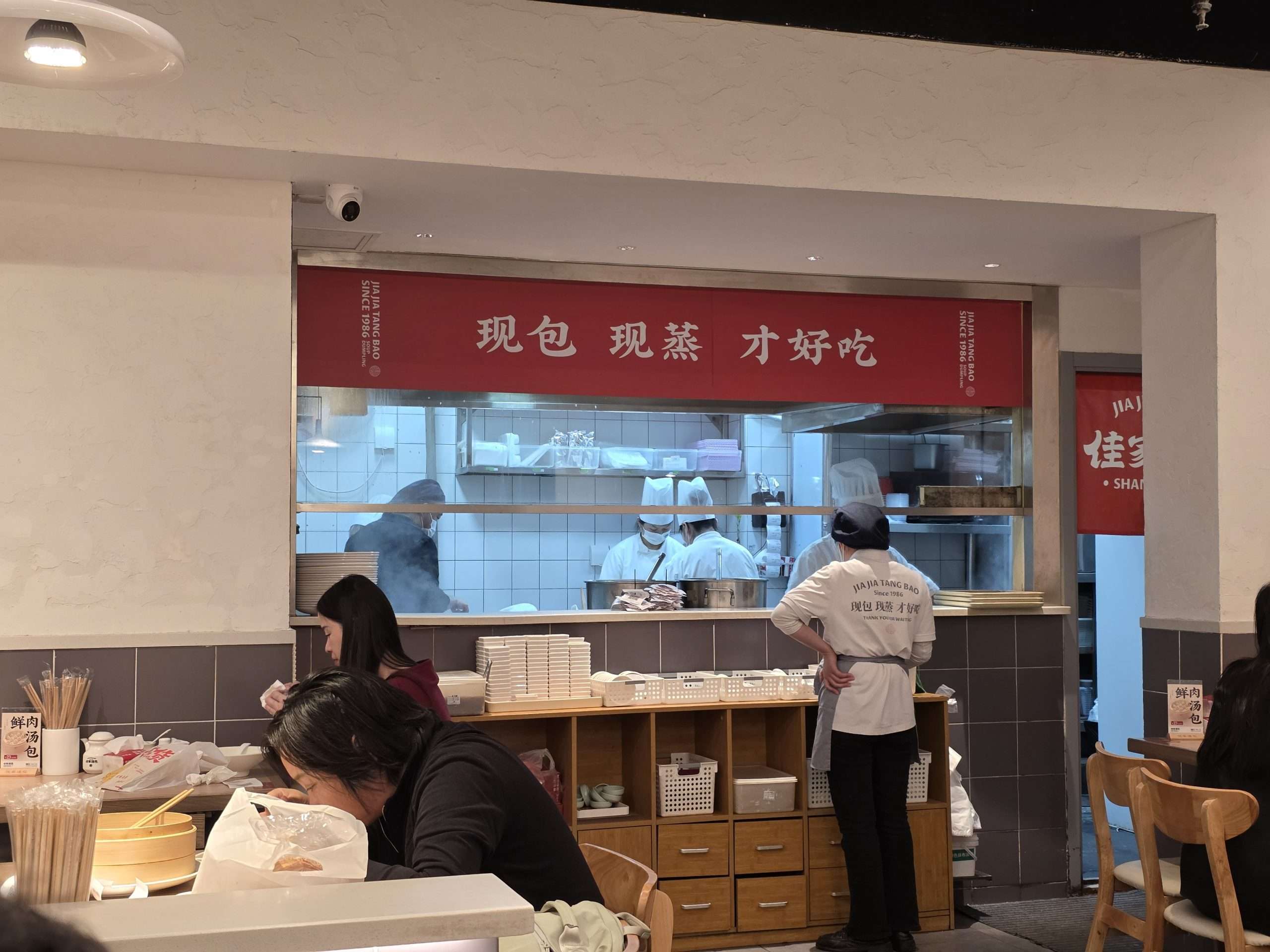 Jia Jia Tang Bao open kitchen chefs steaming dumplings Shanghai