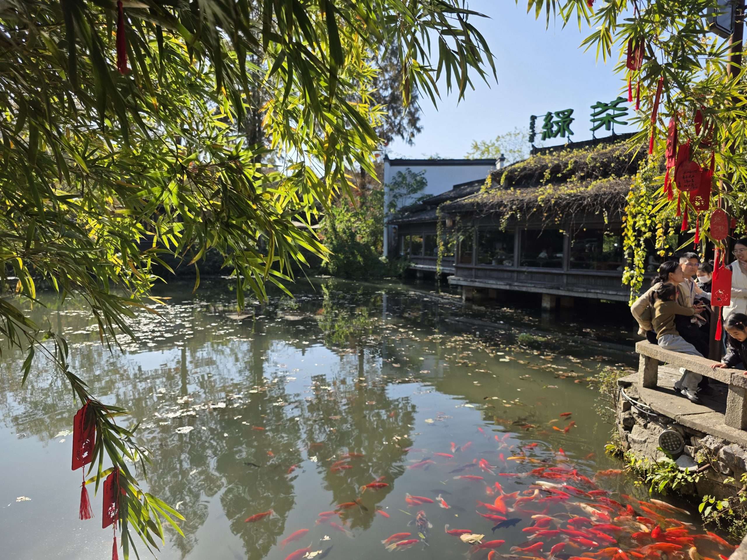 West Lake Hangzhou China crowded tourist area boats on water scenic spot