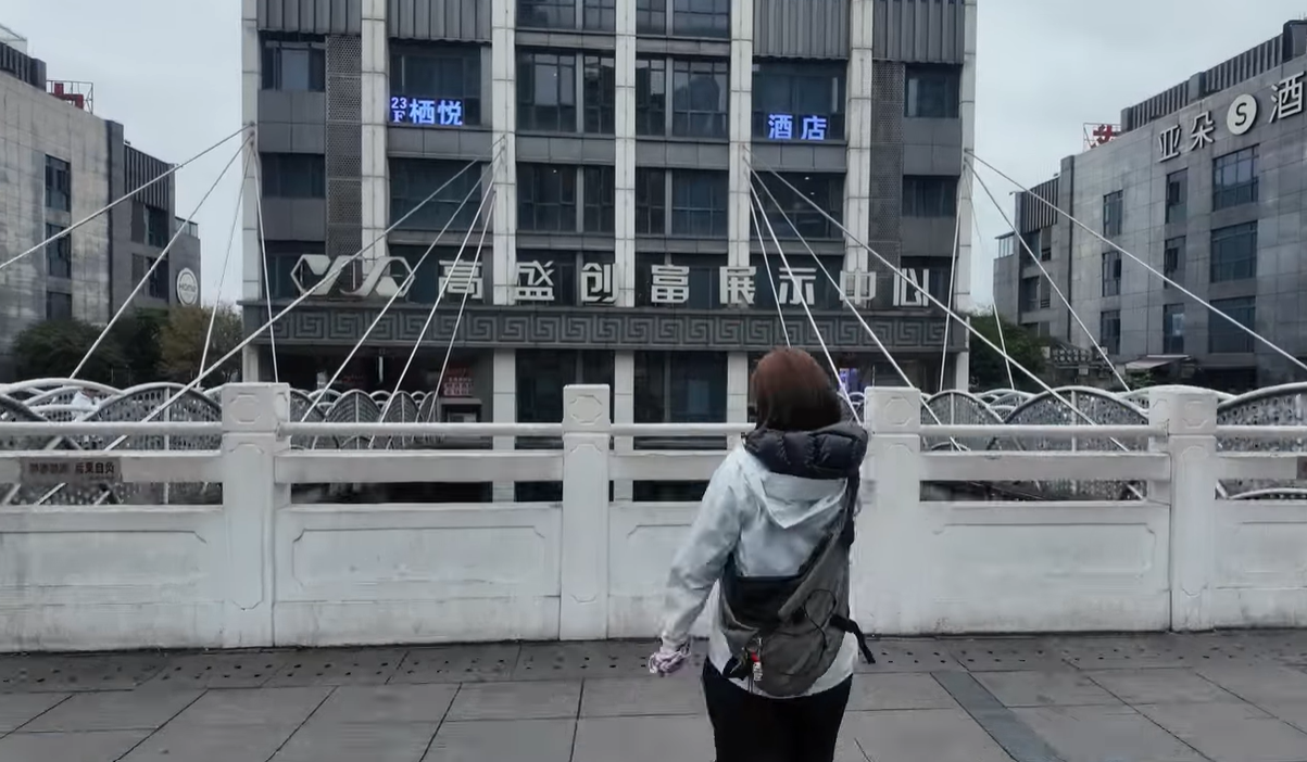  Kuixing Building in Chongqing overlooking layered city skyline.