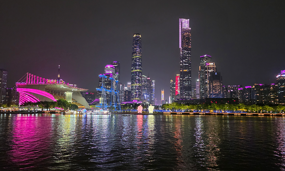 Guangzhou city skyline at night Pearl River China winter travel digital nomad