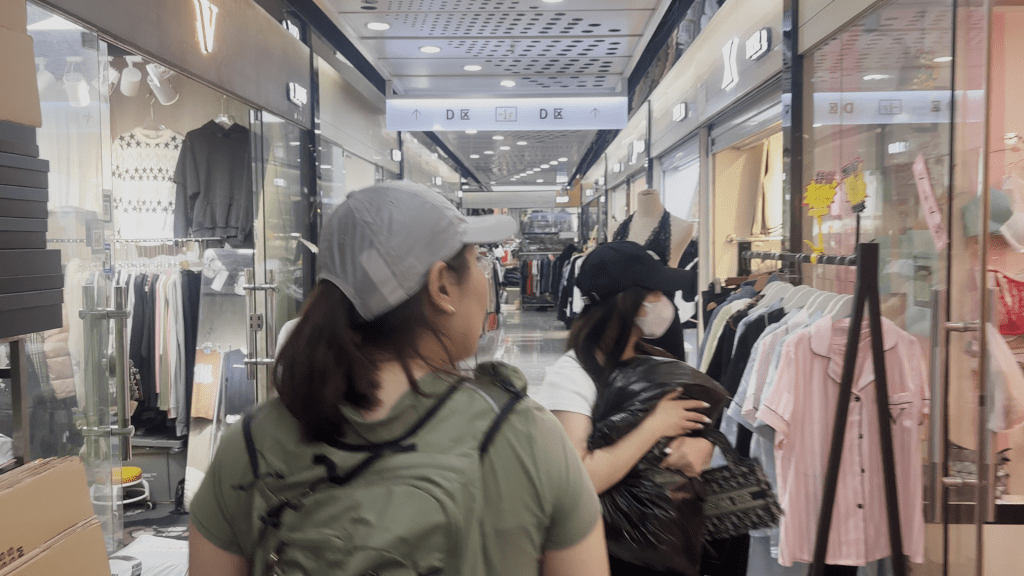 Kimbo market Guangzhou clothing vendors stalls replica brand shopping China