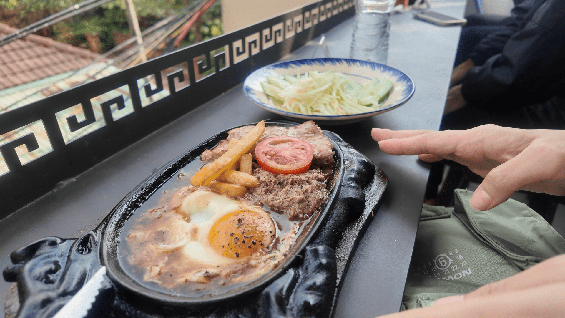 Bo ne sizzling cast iron Banh Mi Gion Ninh Binh Vietnam breakfast