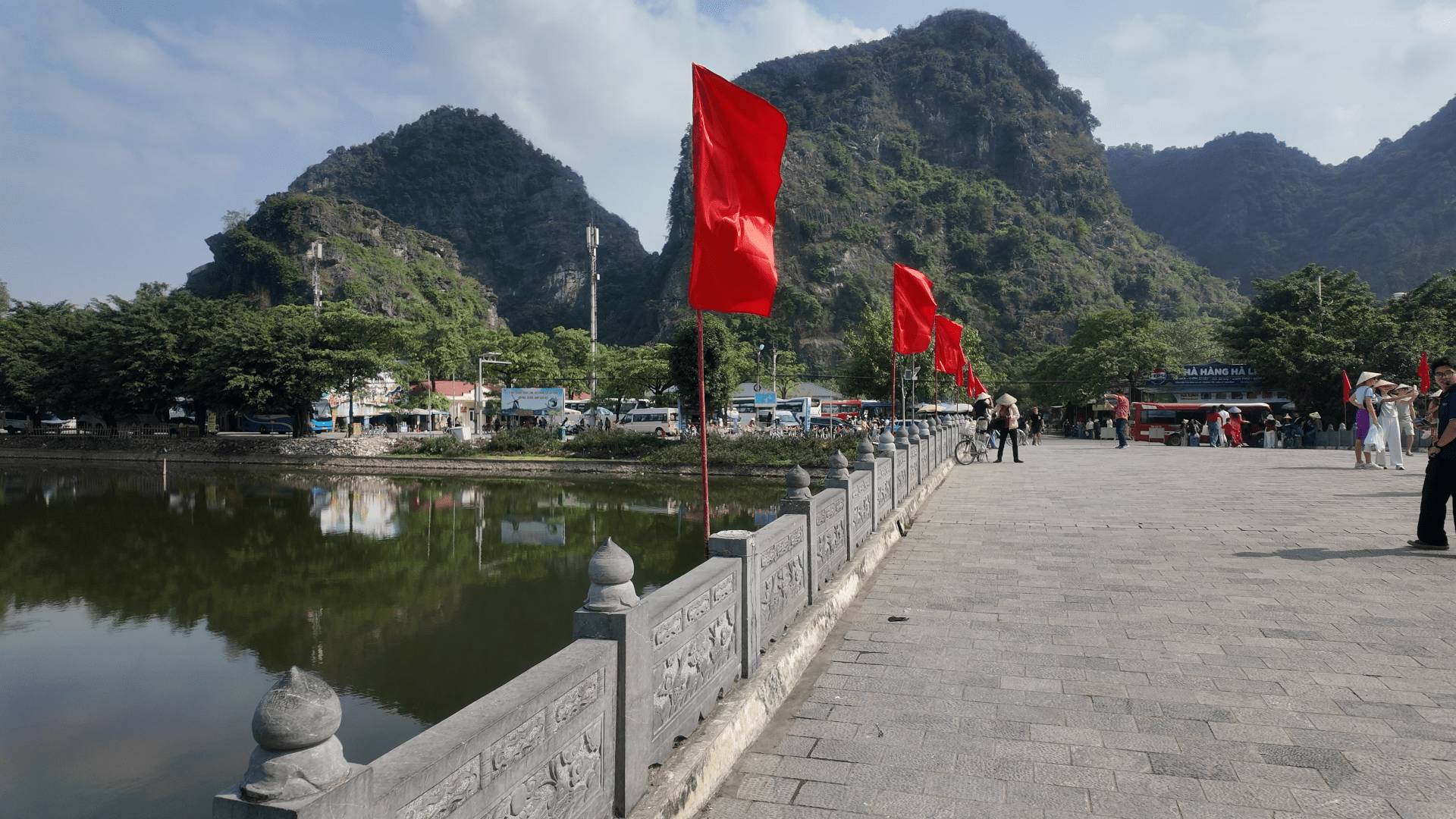 Hoa Lu temple red lacquer pillars curved tiled rooftop Ninh Binh Vietnam