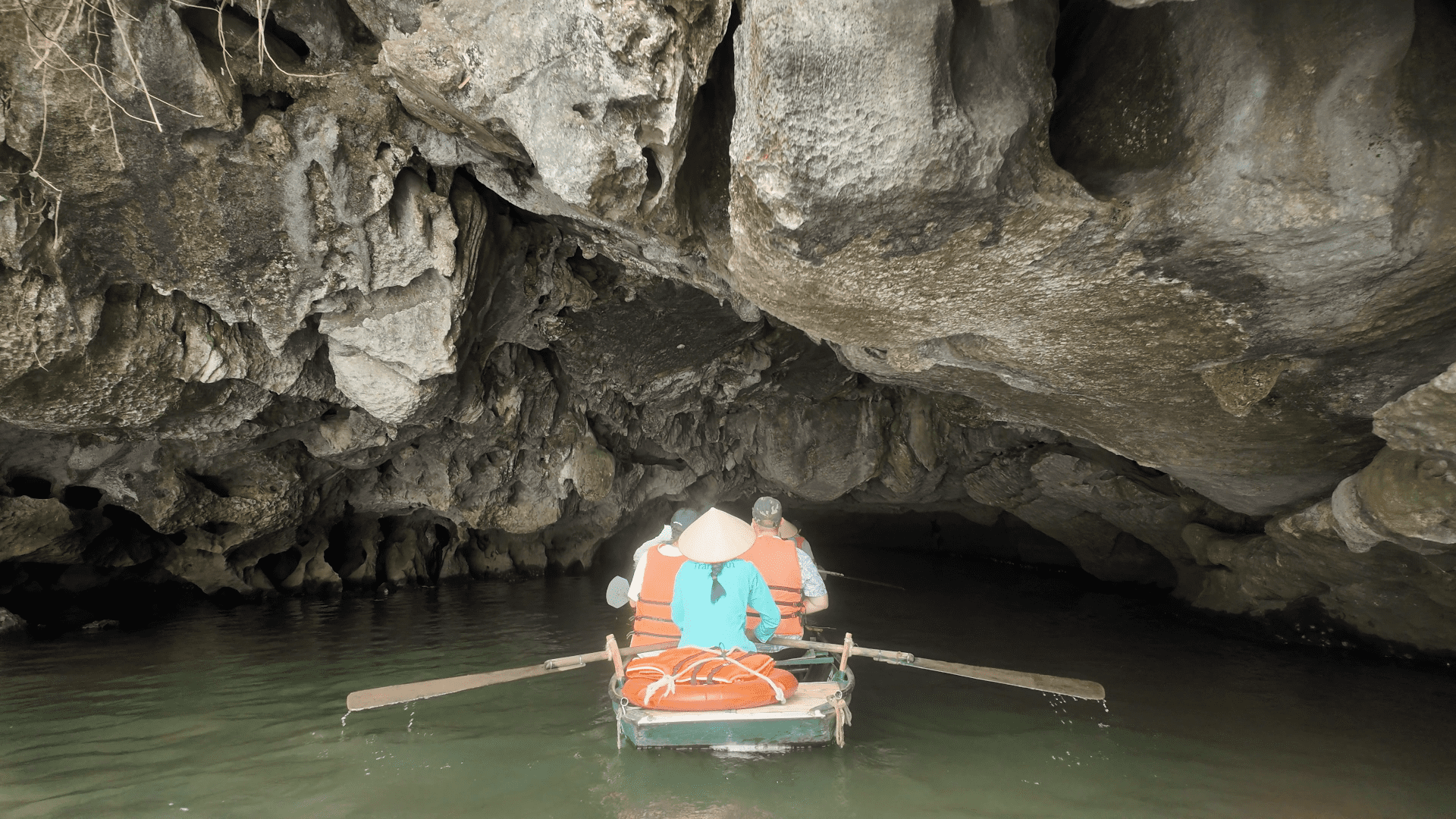 Tam Coc cave entrance bamboo boat dark Ninh Binh Vietnam boat tour