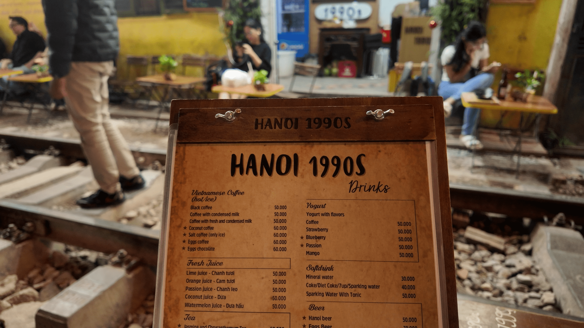 Hanoi train street night coffee shops Vietnam