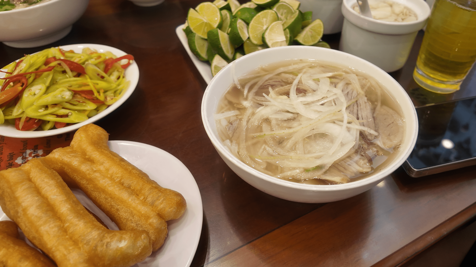 Chinese donuts dipping pho broth Hanoi