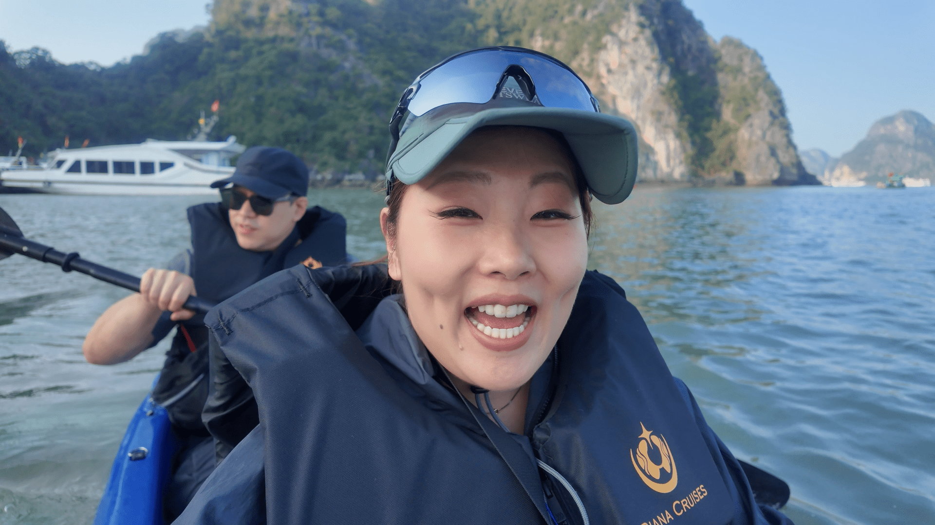 Kayaking limestone karsts Lan Ha Bay Diana cruise Vietnam