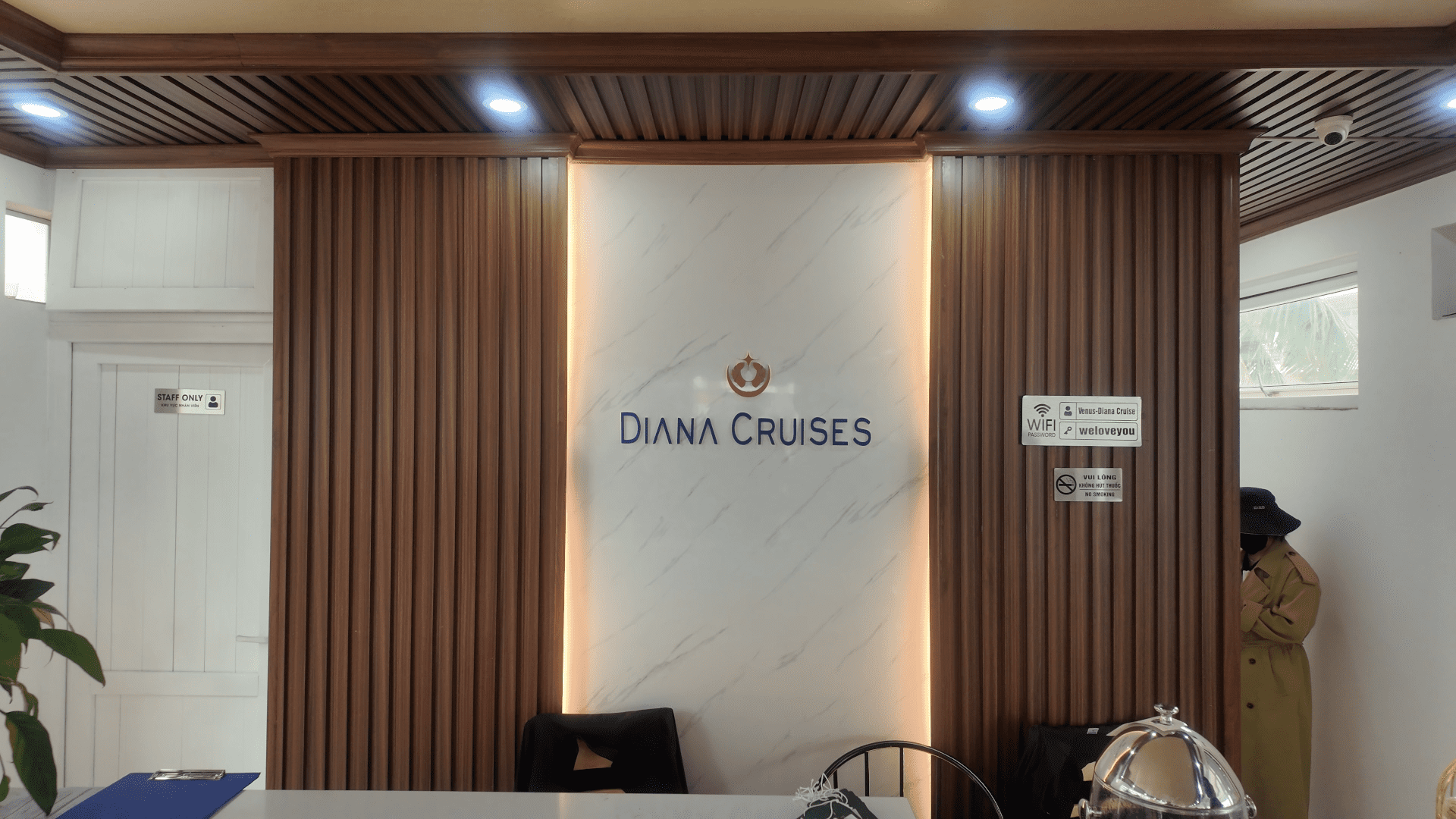 Diana cruises sign check in Lan Ha Bay Vietnam