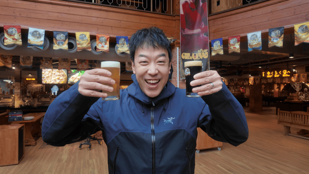 Holding two free Sun KraftBeer beers at Ba Na Hills, Vietnam