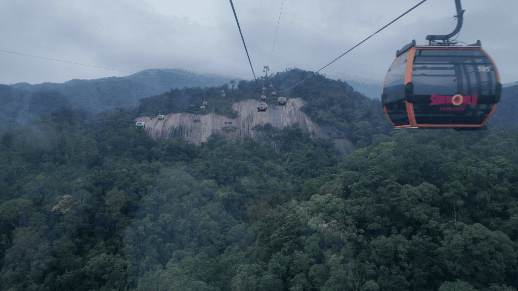Ba Na Hills cable car gondola over forested mountains, Da Nang, Vietnam