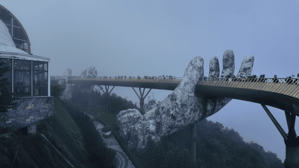 Golden Bridge at Ba Na Hills packed with crowds in the afternoon, Vietnam