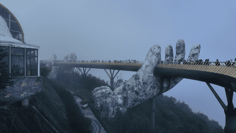 Golden Bridge at Ba Na Hills packed with crowds in the afternoon, Vietnam