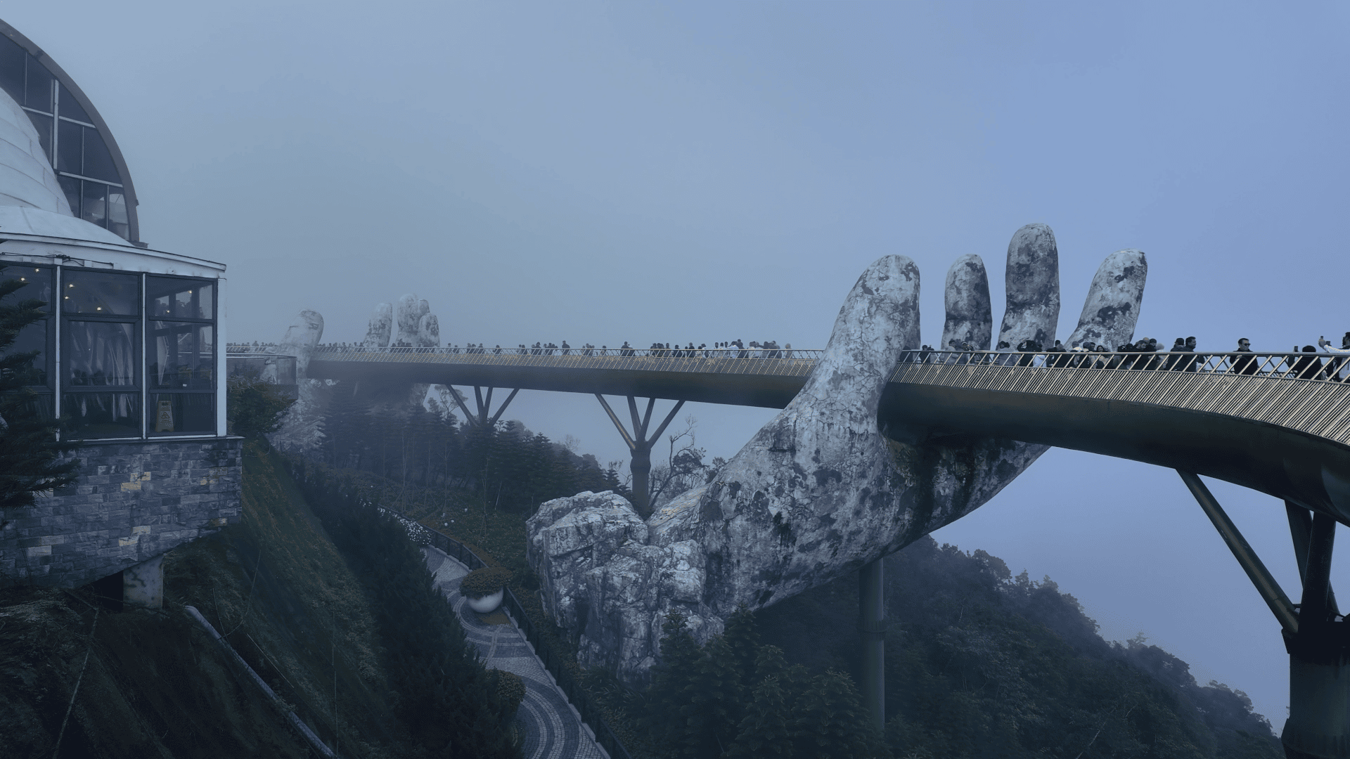Golden Bridge at Ba Na Hills packed with crowds in the afternoon, Vietnam