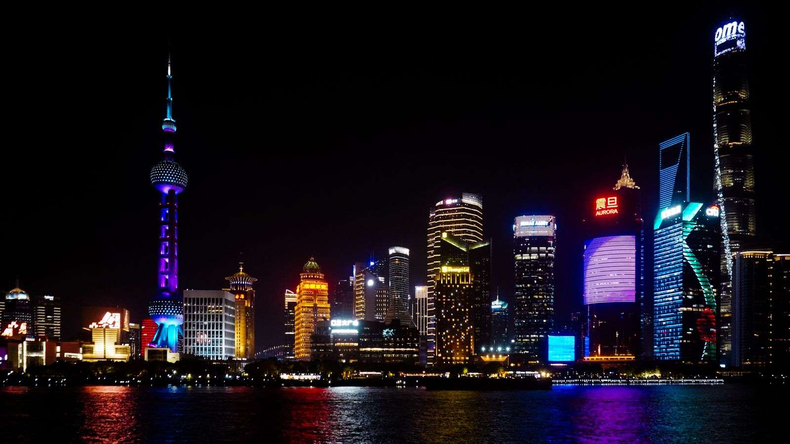 China city at night, staying connected on a travel eSIM